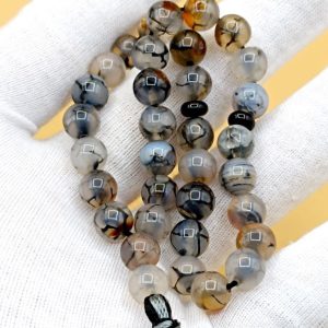 تسبیح عقیق سفید سیاه کد ۱۱۷۶۷